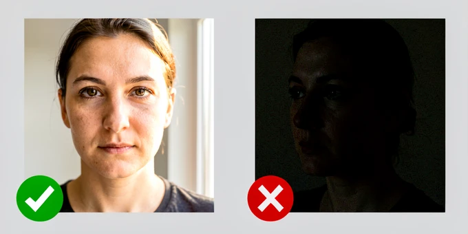 A side-by-side comparison of two portrait reference photos placed on a neutral light gray background. On the left, a sharp, well-lit photograph of a person looking directly at the camera with their full face clearly visible, soft natural window light coming from the right side creating gentle shadows on the left cheek, warm daylight color temperature. On the right, a dimly lit photograph of the same person taken at a 45-degree angle, lower image quality, with the right half of the face in deep shadow and the nose bridge turned away from the viewer. A green checkmark icon overlays the bottom-left corner of the left photo and a red X icon overlays the bottom-left corner of the right photo. Style: clean instructional product comparison on white. Mood: informative and practical.